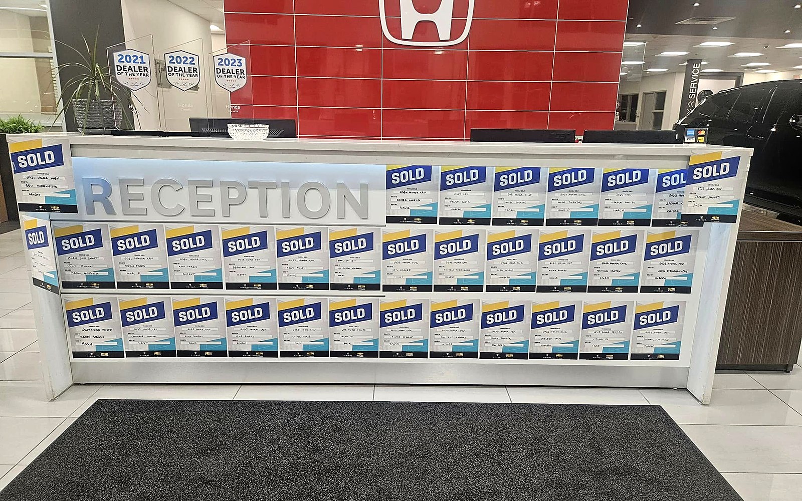 Event momentum made visible: Sold boards keep progress visible throughout the dealership as confirmed appointments become vehicle deliveries.